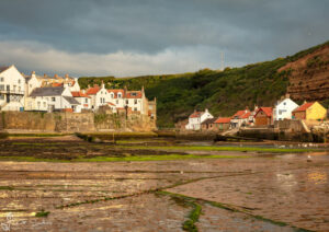 Looking Back On Staithes At Low Tide