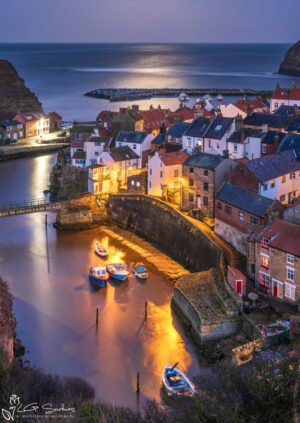 Snow Moonrise Over Staithes Harbour