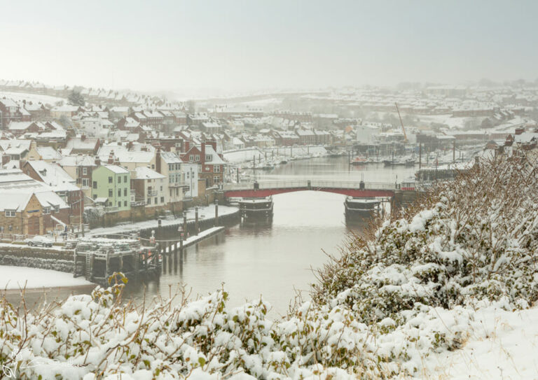 Snow Falling Over Whitby Harbour