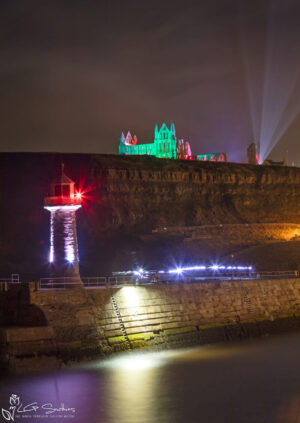Whitby Lighthouse And Illuminated Abbey