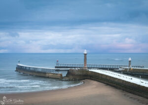 Whitby Piers In The Snow