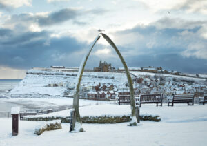 Whitby’s Whalebones And Abbey After Snowfall