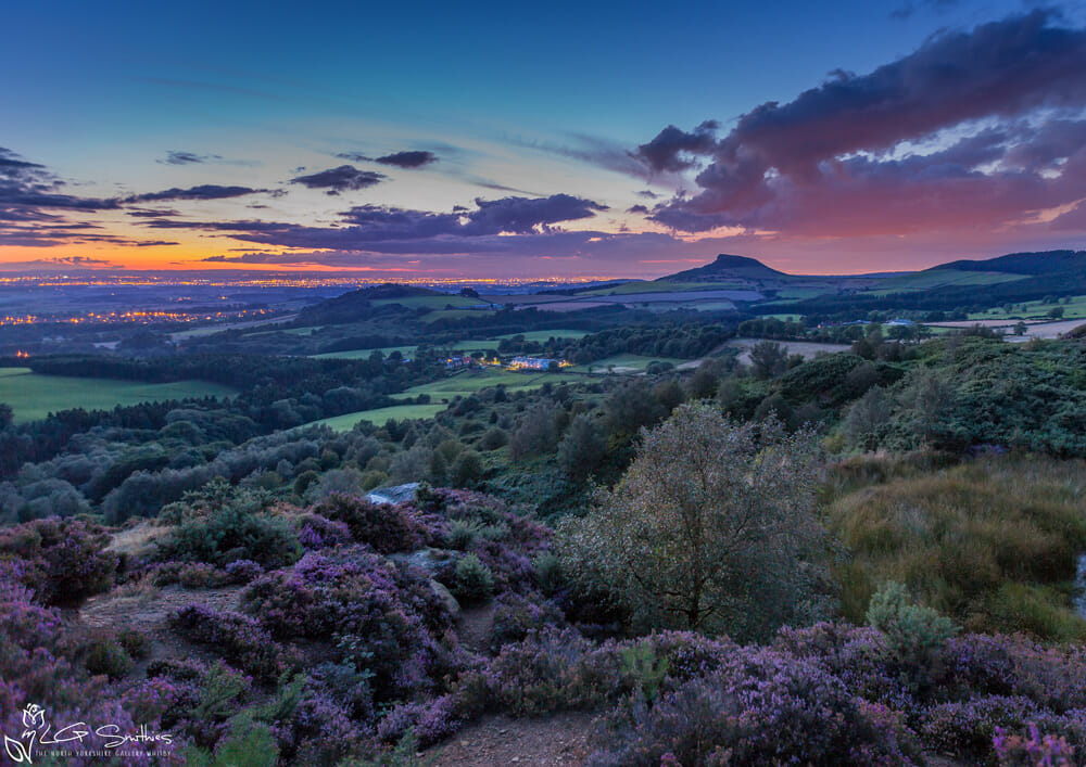 Roseberry-By-Night copy Roseberry Topping at night from the moor with the lights of Middlesbrough behind framed print
