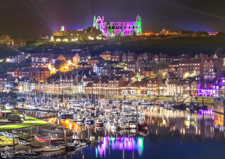 Illuminated Abbey Green and Purple Reflections Over The River Esk