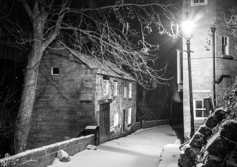 Snow Storm Black And White At Jim Bells Stile At Robin Hoods Bay