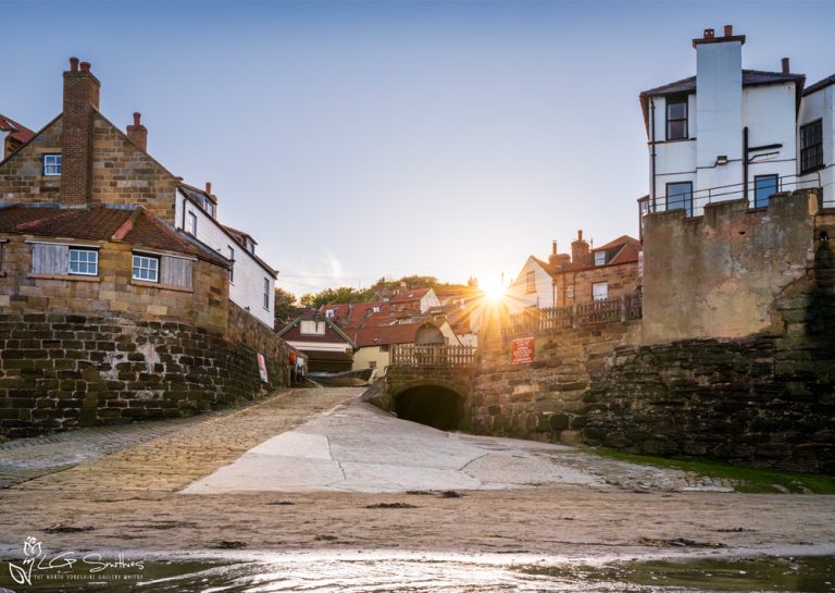 Sunset At Robin Hoods Bay Dock