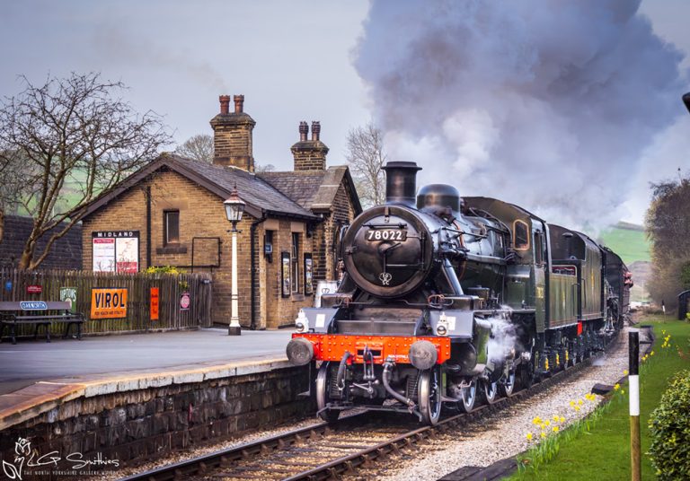 Steam Engine Passing The Famous Oakworth Station KWVR